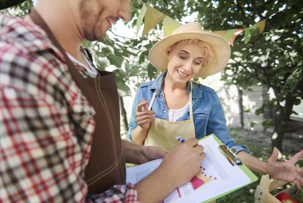 Farmers talking in community garden